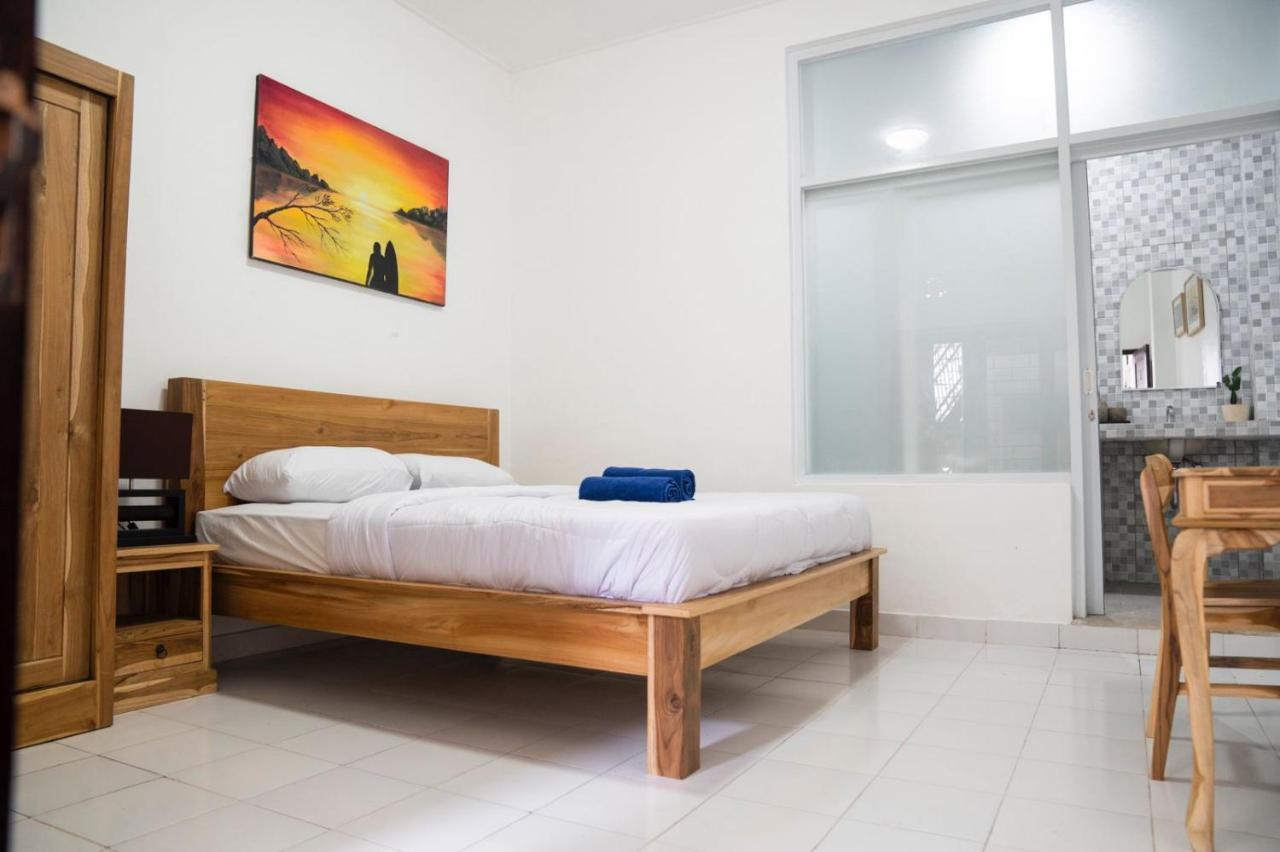 קנגו Sunrise Surf Guest House מראה חיצוני תמונה